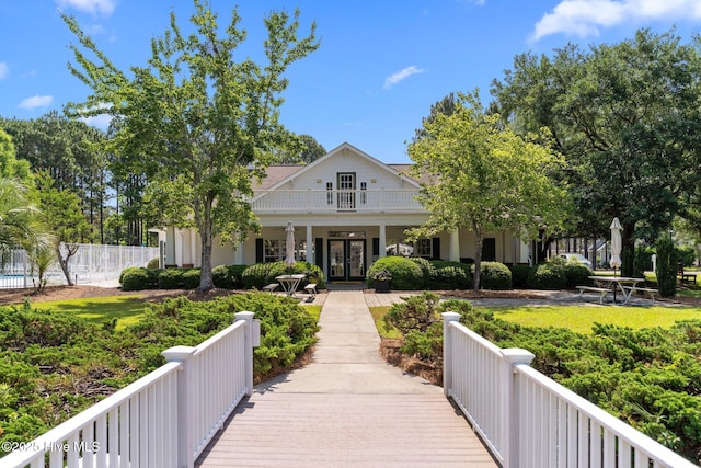 3665 Willow Lake Dr SE, Southport, NC 28461 - back of house featuring french doors