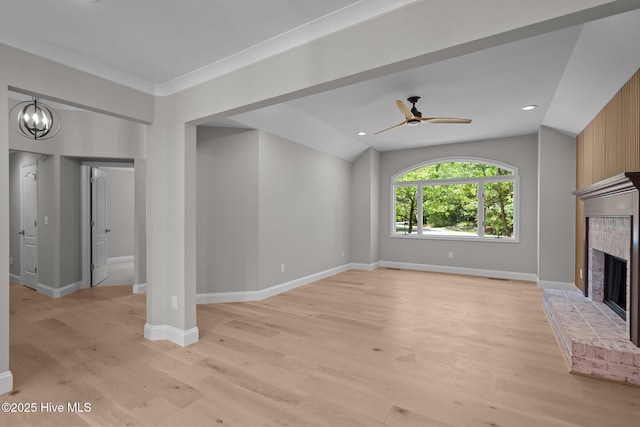101 Marshview Rd, Hampstead, NC 28443 - unfurnished living room with light wood-style floors, a fireplace, ceiling fan, baseboards, and lofted ceiling