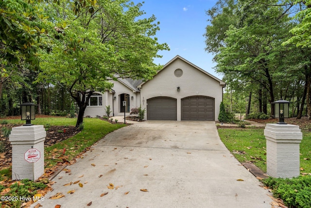 101 Marshview Rd, Hampstead, NC 28443 - view of front of home featuring a garage, driveway, and a front lawn