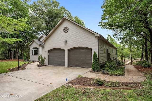 101 Marshview Rd, Hampstead, NC 28443 - view of front of house with driveway, a garage, and brick siding