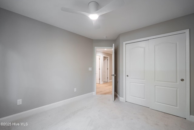 101 Marshview Rd, Hampstead, NC 28443 - unfurnished bedroom featuring carpet, baseboards, a closet, and a ceiling fan