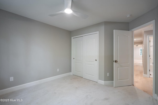 101 Marshview Rd, Hampstead, NC 28443 - unfurnished bedroom featuring a closet, baseboards, carpet flooring, and ceiling fan