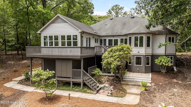 101 Marshview Rd, Hampstead, NC 28443 - back of property featuring a deck and a shingled roof