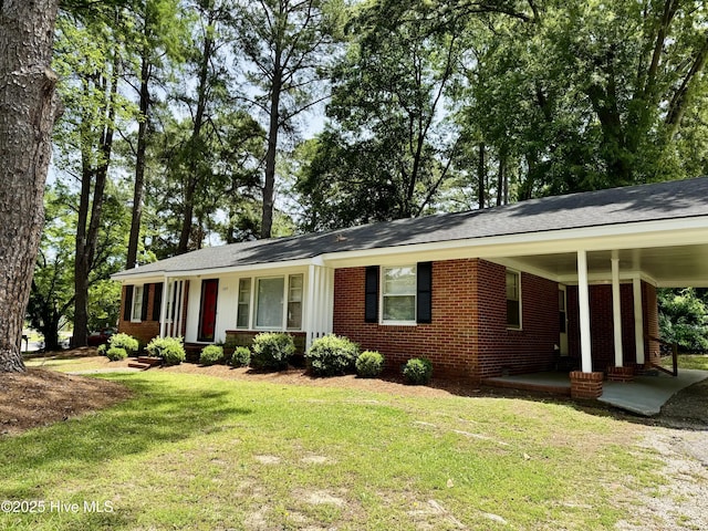 1305 Westwood Ave W, Wilson, NC 27893 - ranch-style house featuring a front lawn, brick siding, and a shingled roof