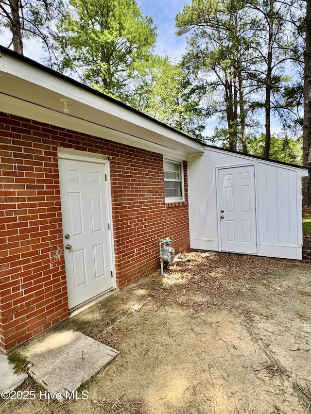 1305 Westwood Ave W, Wilson, NC 27893 - property entrance with brick siding