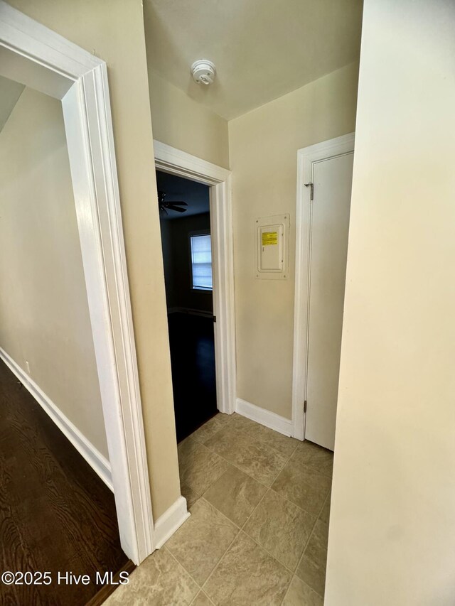 1305 Westwood Ave W, Wilson, NC 27893 - hallway with electric panel and baseboards