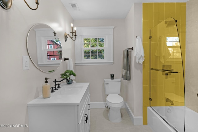 107 Rockingham Rd, Rockingham, NC 28379 - full bathroom with vanity, toilet, tile patterned floors, enclosed tub / shower combo, and baseboards