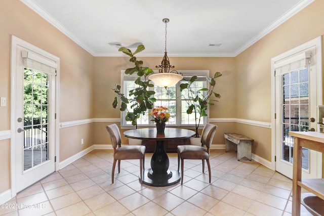 207 Hooping Crane Ln, Goldsboro, NC 27530 - dining room with light tile patterned flooring, crown molding, and baseboards
