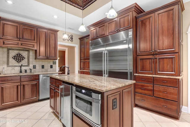 207 Hooping Crane Ln, Goldsboro, NC 27530 - kitchen with stainless steel appliances, a sink, light tile patterned floors, ornamental molding, and decorative backsplash