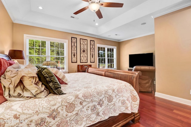 207 Hooping Crane Ln, Goldsboro, NC 27530 - bedroom featuring a tray ceiling, wood finished floors, baseboards, recessed lighting, and a ceiling fan