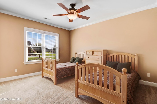 207 Hooping Crane Ln, Goldsboro, NC 27530 - carpeted bedroom with baseboards, ornamental molding, and ceiling fan