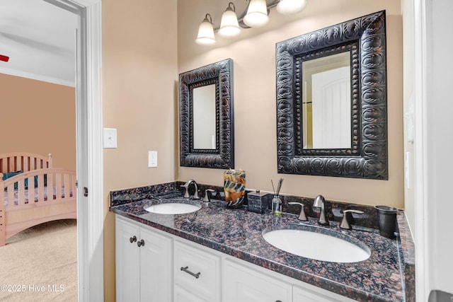 207 Hooping Crane Ln, Goldsboro, NC 27530 - ensuite bathroom with ornamental molding and double vanity