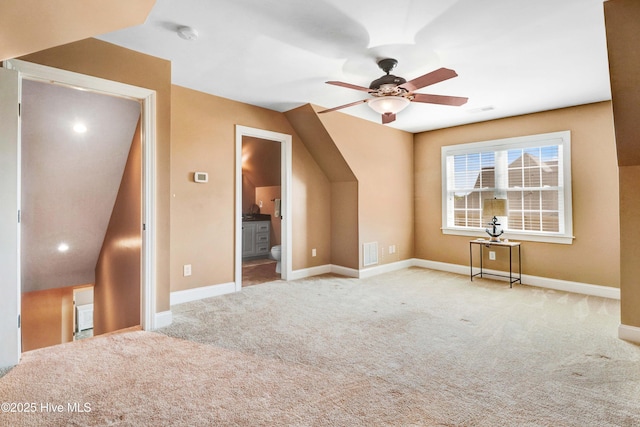 207 Hooping Crane Ln, Goldsboro, NC 27530 - bonus room with ceiling fan, carpet, and baseboards