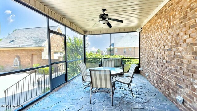 207 Hooping Crane Ln, Goldsboro, NC 27530 - sunroom / solarium with ceiling fan and outdoor dining area