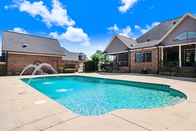 207 Hooping Crane Ln, Goldsboro, NC 27530 - swimming pool with a patio and a sunroom
