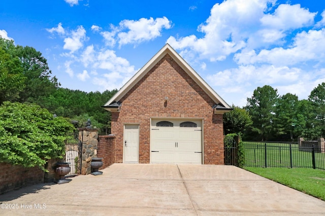 207 Hooping Crane Ln, Goldsboro, NC 27530 - detached garage featuring driveway