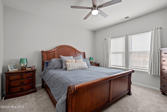 5021 Northstar Dr, Leland, NC 28451 - bedroom with light carpet, baseboards, and ceiling fan