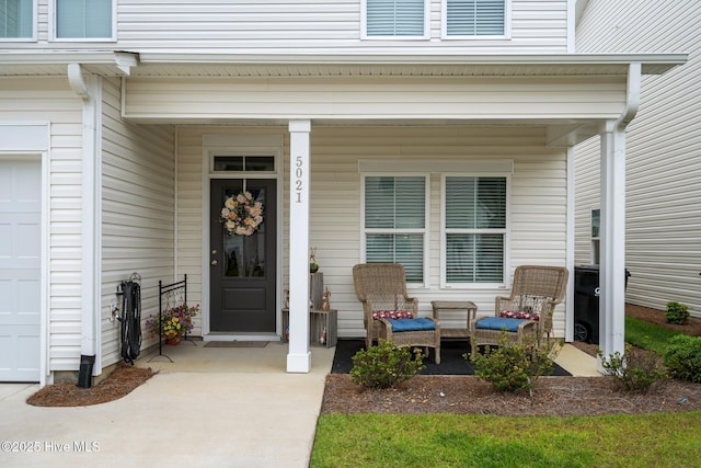 5021 Northstar Dr, Leland, NC 28451 - doorway to property with a porch and a garage