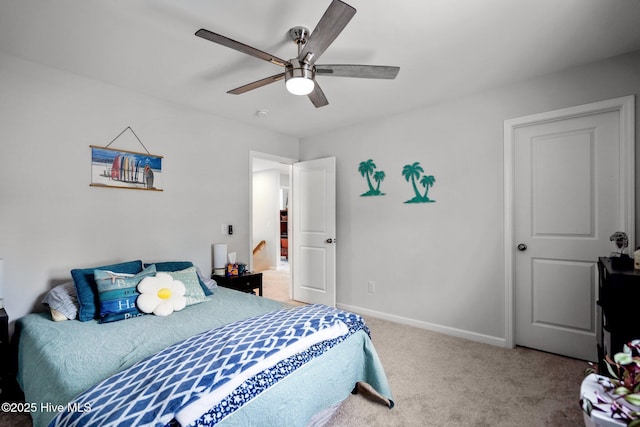 5021 Northstar Dr, Leland, NC 28451 - carpeted bedroom featuring baseboards and a ceiling fan