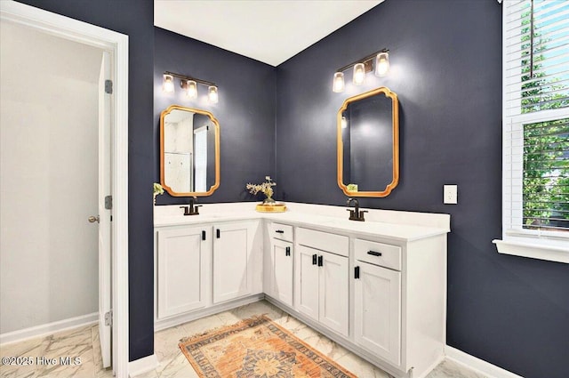 1114 Treyburn Ct NW, Calabash, NC 28467 - bathroom featuring baseboards, marble look tile flooring, and double vanity