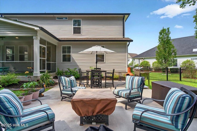 1114 Treyburn Ct NW, Calabash, NC 28467 - view of patio / terrace featuring outdoor dining space, a sunroom, and an outdoor hangout area