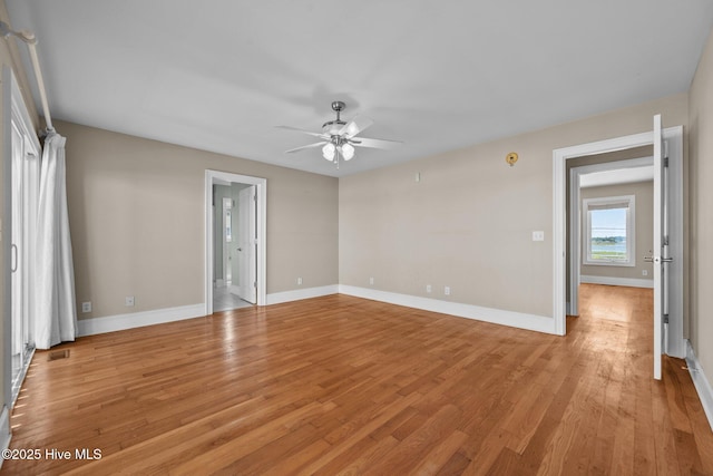 905 N Anderson Blvd, Topsail Beach, NC 28445 - unfurnished room featuring a ceiling fan, light wood-style floors, and baseboards
