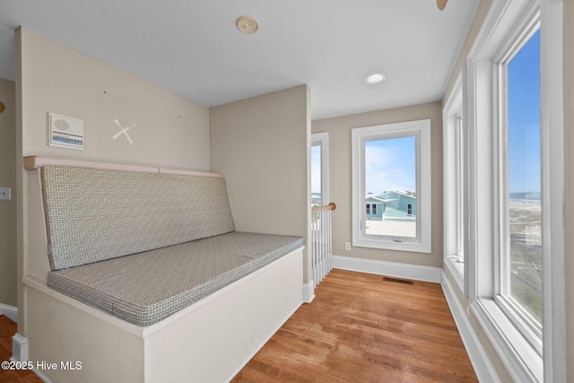 905 N Anderson Blvd, Topsail Beach, NC 28445 - hall featuring wood finished floors, baseboards, and recessed lighting