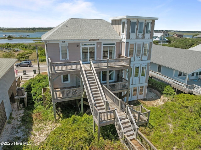 905 N Anderson Blvd, Topsail Beach, NC 28445 - rear view of house featuring stairway and a deck with water view