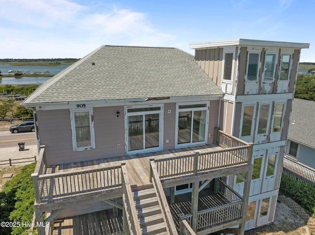 905 N Anderson Blvd, Topsail Beach, NC 28445 - rear view of house with roof with shingles and a deck with water view