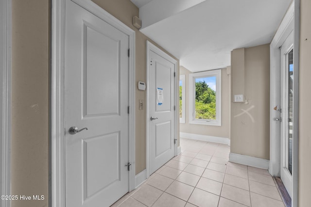 905 N Anderson Blvd, Topsail Beach, NC 28445 - entryway featuring baseboards and light tile patterned floors