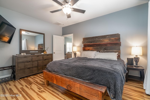 106 NW 8th St, Oak Island, NC 28465 - bedroom featuring light wood-type flooring and ceiling fan