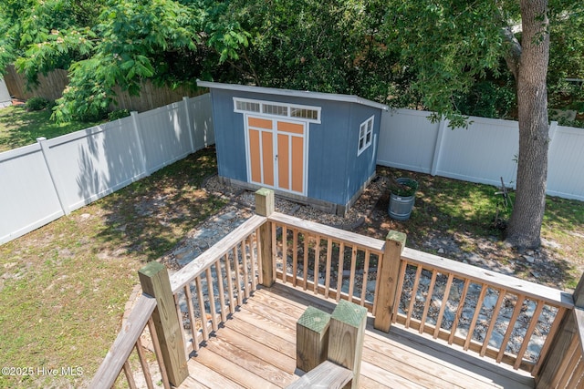 106 NW 8th St, Oak Island, NC 28465 - wooden terrace featuring a fenced backyard