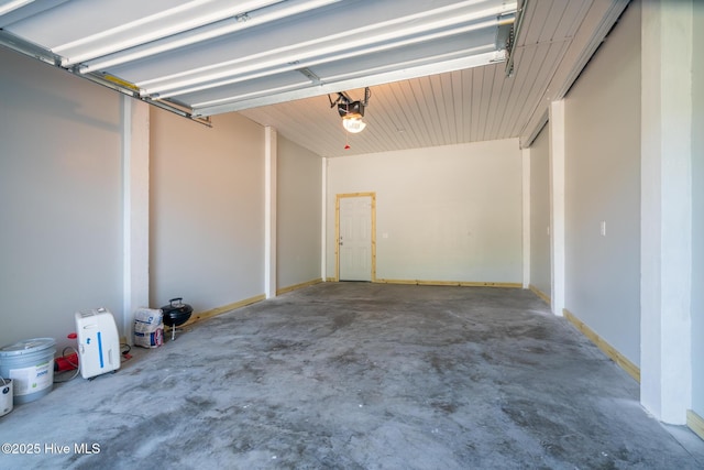 106 NW 8th St, Oak Island, NC 28465 - garage featuring a garage door opener