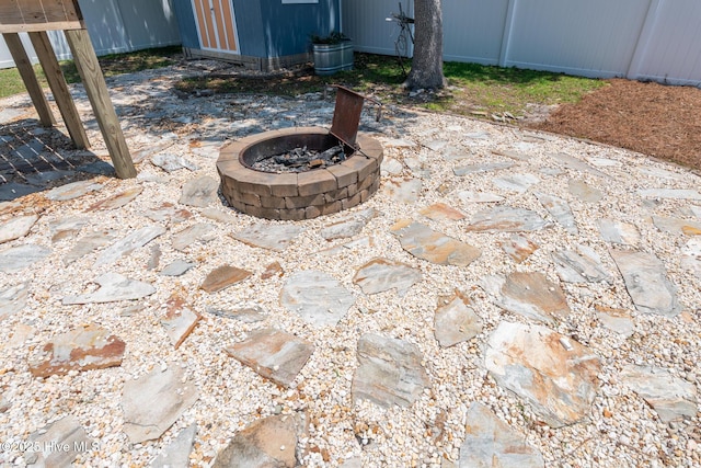 106 NW 8th St, Oak Island, NC 28465 - exterior view of an outdoor fire pit