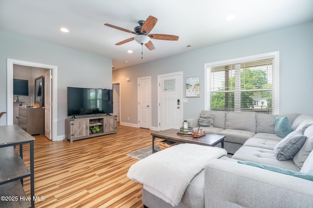 106 NW 8th St, Oak Island, NC 28465 - living room featuring a ceiling fan, light wood-style flooring, recessed lighting, and baseboards