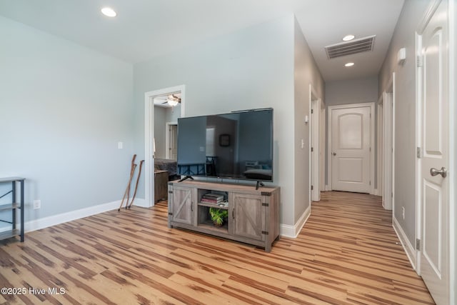 106 NW 8th St, Oak Island, NC 28465 - living area featuring light wood-style flooring, baseboards, recessed lighting, and a ceiling fan