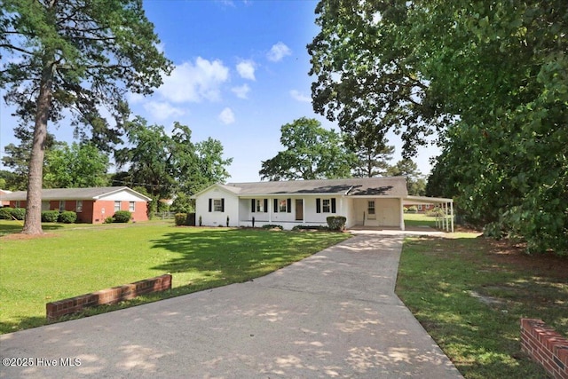 1102 Elanor Ave, Goldsboro, NC 27530 - single story home with driveway, a front lawn, and a carport