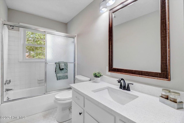 1102 Elanor Ave, Goldsboro, NC 27530 - bathroom with vanity, toilet, enclosed tub / shower combo, and tile patterned flooring