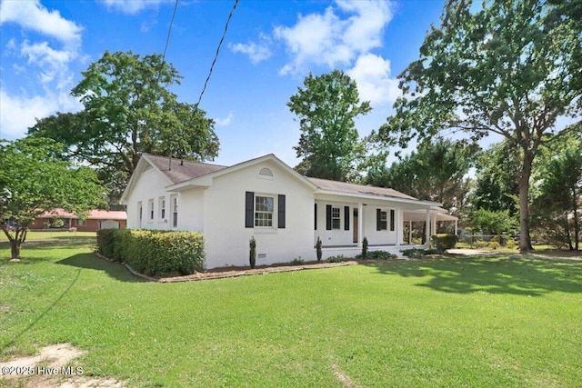 1102 Elanor Ave, Goldsboro, NC 27530 - ranch-style house with a front lawn and covered porch