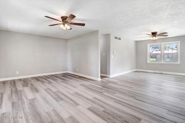 1102 Elanor Ave, Goldsboro, NC 27530 - spare room with ceiling fan, wood finished floors, and a textured ceiling