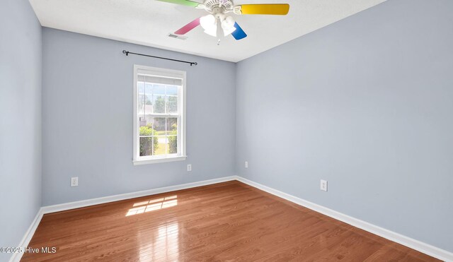 416 Point View Ct, Wilmington, NC 28411 - unfurnished room featuring wood finished floors, baseboards, and a ceiling fan