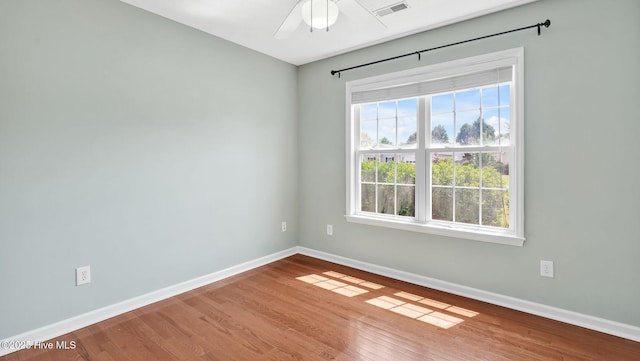 416 Point View Ct, Wilmington, NC 28411 - empty room featuring baseboards, wood finished floors, and ceiling fan