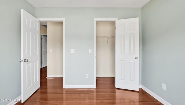 416 Point View Ct, Wilmington, NC 28411 - unfurnished bedroom featuring wood finished floors, a closet, and baseboards