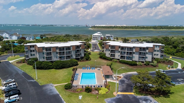 2008 E Fort Macon Rd Unit A-1, Atlantic Beach, NC 28512 - drone / aerial view of a pool, a nearby body of water, and apartment complex