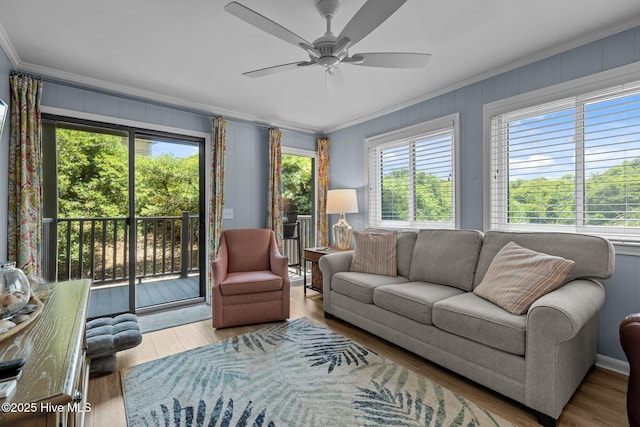 2008 E Fort Macon Rd Unit A-1, Atlantic Beach, NC 28512 - living area featuring crown molding, ceiling fan, and wood finished floors
