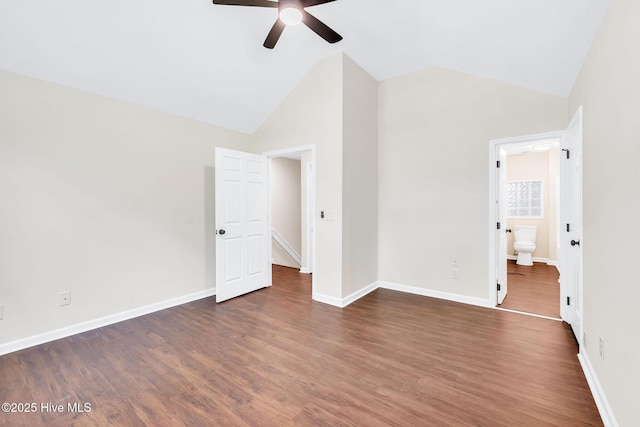562 Anchor Way, Kure Beach, NC 28449 - empty room with a ceiling fan, wood finished floors, baseboards, and high vaulted ceiling