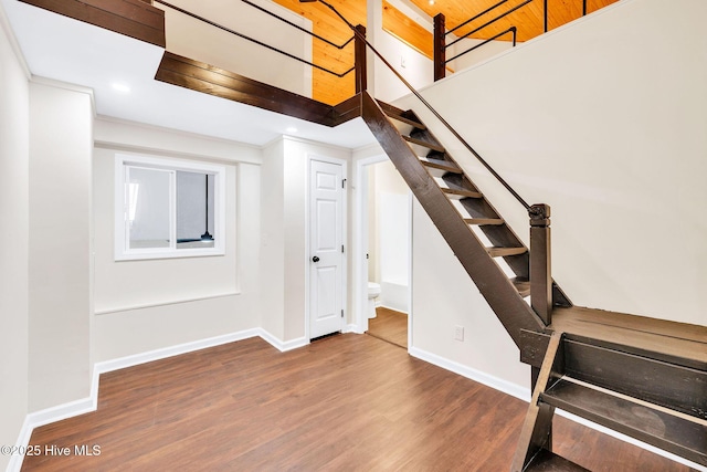 562 Anchor Way, Kure Beach, NC 28449 - stairway with wood finished floors and baseboards