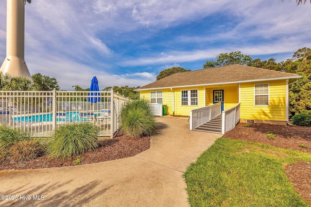 562 Anchor Way, Kure Beach, NC 28449 - view of front of property with roof with shingles and crawl space