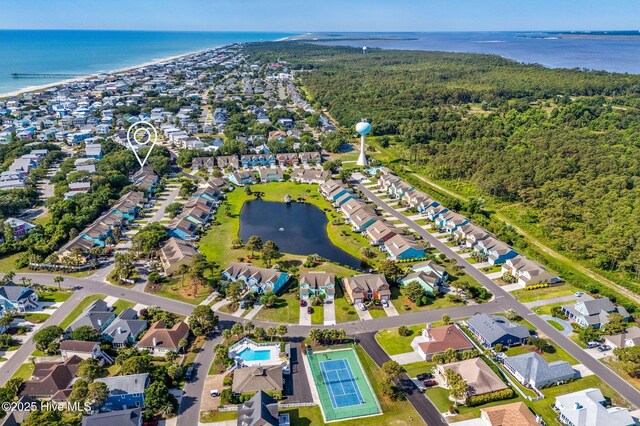 562 Anchor Way, Kure Beach, NC 28449 - aerial view of property's location featuring a large body of water, a forest, and nearby suburban area