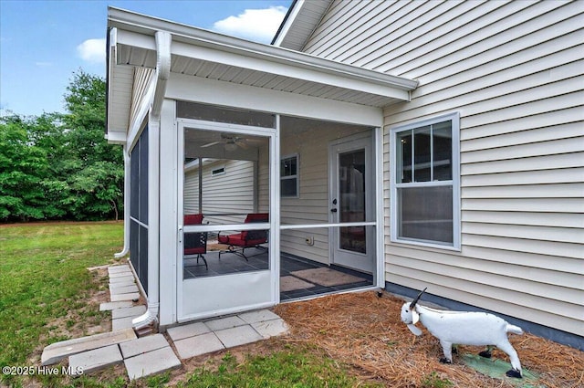 2121 Maple Leaf Dr, Southport, NC 28461 - view of exterior entry featuring a yard